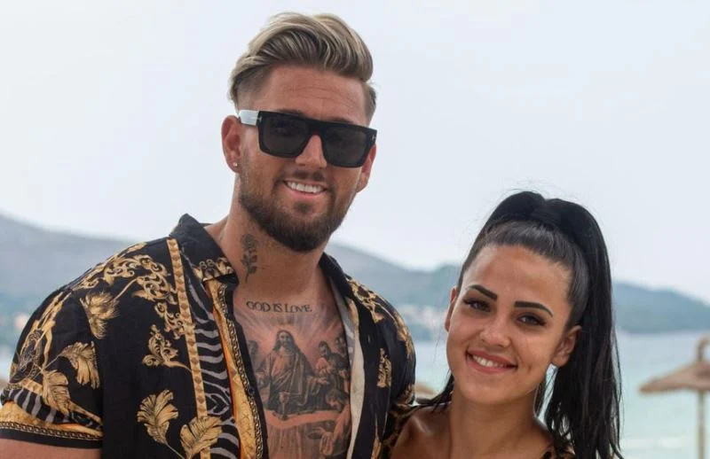 A picture of Elena Miras with Mike Heiter
